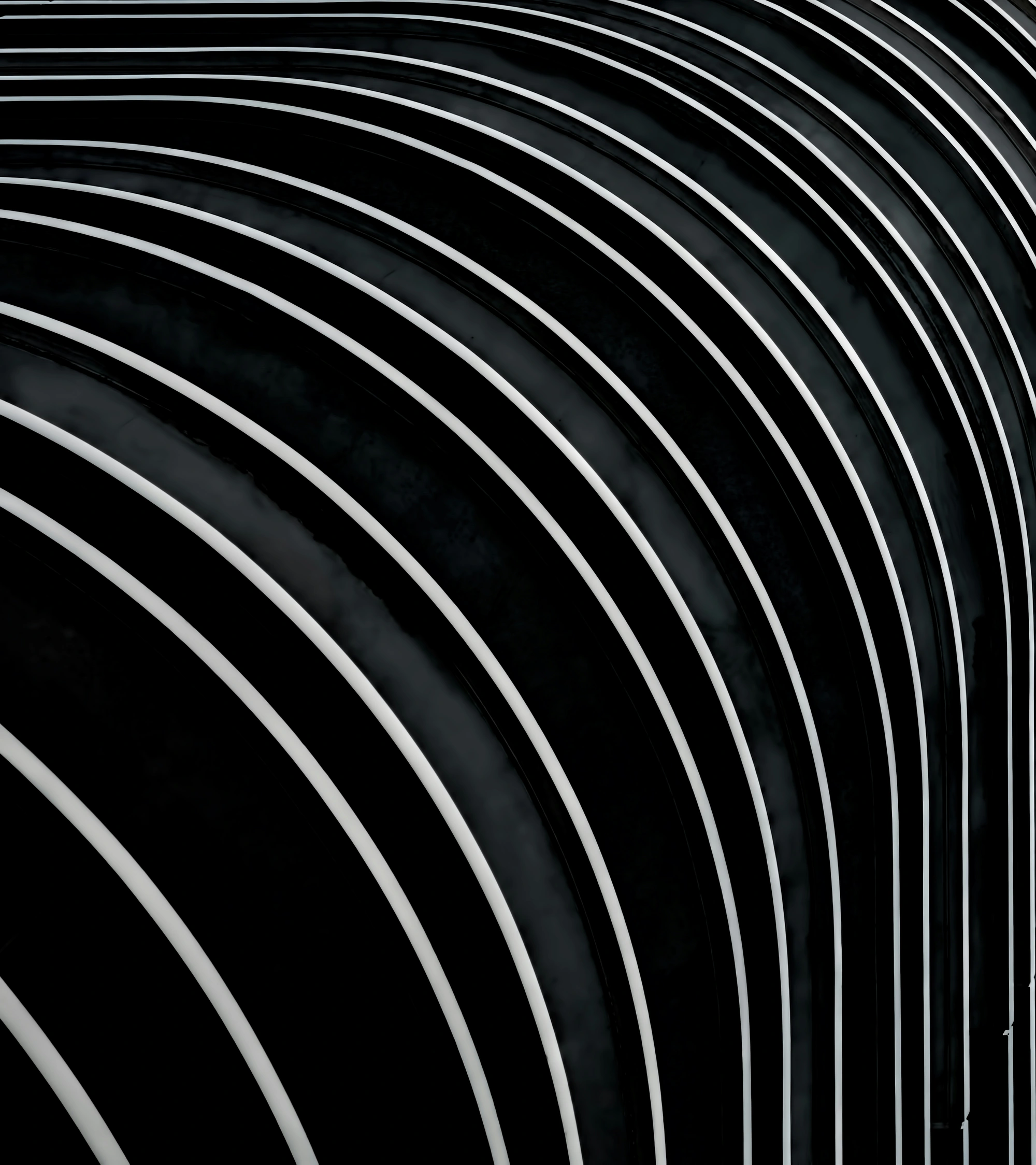 Sweeping curved white architectural lines against deep black.